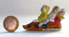 ANCIENNE FIGURINE EN BISCUIT / ENFANTS SUR UNE LUGE / NOËL