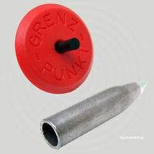 Geocaching Versteck getarnt als Grenzpunkt rot Vermarkungsrohr Kappe Splint