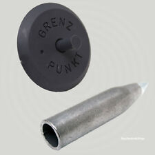 Geocaching Versteck getarnt als Grenzpunkt grau Vermarkungsrohr Kappe Splint