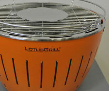 LotusGrill Holzkohlegrill, Orange, wie neu inkl. Zubehör-Set