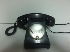 Ancien téléphone en bakélite a palette